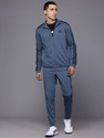 ADIDAS Striped Men Track Suit