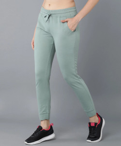 alan jones solid women light green track pants