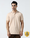 Blackberrys Solid Men Polo Neck Beige T-Shirt