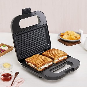 borosil grill sandwich maker  can make 2 large sandwich  made in india bis approved  nonstick coated plates even grilling  cool touch handle  indicator light  2 years warranty novus grill
