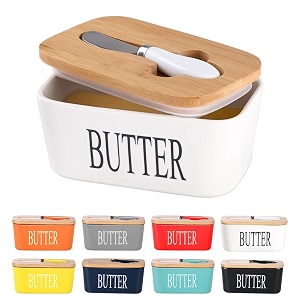 ceramic butter dish with bamboo lid and stainless steel knife spreader