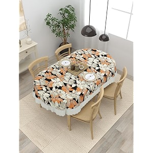 clasiko 4 seater oval dining table cover 54x78 inches or 137x198 cms material - pvc anti slip orange cream leaves