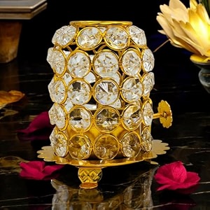 elegant crystal diya for home dcor  sparkling tealight holder for pooja festivals amp gifting  premium decorative diya for divine illumination  ideal for gifting 15 nag