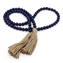 CVHOMEDECO. Wood Beads Garland with Tassels Farmhouse Rustic Wooden Prayer Bead String Wall Hanging Accent for Home Festival Decor. Navy Blue