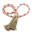 CVHOMEDECO. Wood Beads Garland with Tassels Farmhouse Rustic Wooden Prayer Bead String Wall Hanging Accent for Home Festival Decor. Pink Mix Distressed