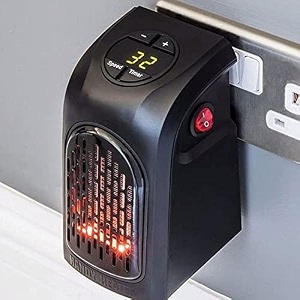 daybetter electric handy room heater with button controls 400 watt fan room heater black tar1-01