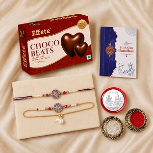 deodap rakhi and lumba set for brother and bhabhi with chocolate coated almonds silver colour pooja coin and greeting card - five piece combo