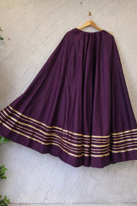 desi butik solid women flared purple skirt