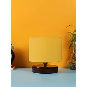 devansh yellow cotton table lamp with wood brown base