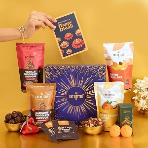 dhoom gift hamper - 10-item diwali gift - assorted healthy dry fruits laddoos nut mixes decorative motichoor laddoo candles amp seed ball  diwali gift box for friends family amp corporate gifting