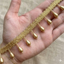 DIVARA DIVARAGolden hanging pearl 4050(pack of 4meter) With Beautiful design , used in saree , suit, and many more purpose. Lace Reel