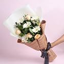 FlowerAura Premium Fresh Live Flower Bouquet of 5 Roses & 5 Gerbera In Newspaper Packing Gift For Birthday | Anniversary | Love | Home Decor | Fathers Day Gift For Dad (Same Day Delivery)