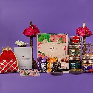 gladful 10 products diwali pink floral gift hamper premium healthy gift hamper roasted legume snacks dates nut sqaures chocolate brittles ganesh diya diwali greetings card