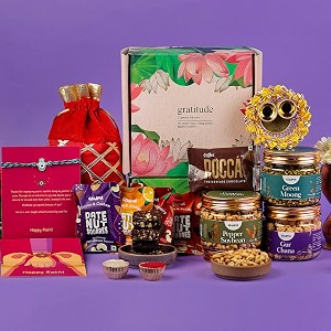 gladful 12 products pink floral rakhi premium healthy delights gift hamper roasted snacks jars dates nut sqaures rocca chocolate brittle rakhi