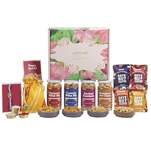 gladful gourmet rakhi gift hamper with 12 items millet mixes herbed namkeen gur chana date nut squares rakhi set roli chawal amp potli