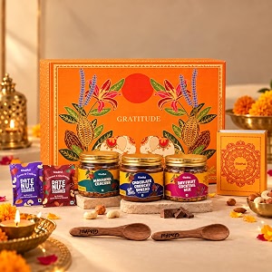gladful orange gratitude diwali gift box  8 items  chocolate crunchy spread cocktail nut mix makhana cracker amp date nut squares  thoughtful festive gift hamper with greeting card