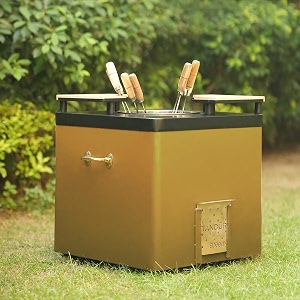haus of bars by speedx- charcoal tandur with 4 skewers and 2 wooden plates  home cooking tandoor crafted with a blend of clay amp metal 20x20x20 inches square matt gold