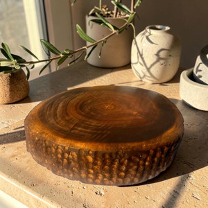 Hutson Micklyn sheehsam wood round chopping board.