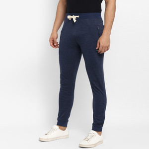 joven men solid dark blue track pants