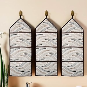 kuber industries wall hanging organizer  3 multi-purpose storage pocket  foldable document holder  hanging stationary organizer  magazine organizer  wave-design  cream