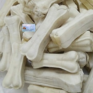 premium rawhide chew bone for dogs pressed calcium-enriched bone treat 4 inches long ideal for adult dogs 1 kilogram single count