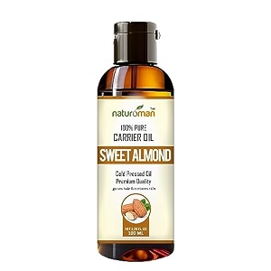 naturoman cold pressed almond carrier oil  suitable for all skin types  natural amp pure  for skin hair face body amp massage  pack of 1  200 ml