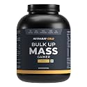 Nutrabay Gold Bulk Up Mass Gainer Powder - 3kg, Mango | 30g Protein, 104g Carbs, 554 Calories | Easy to Digest | 100% Veg Muscle Building &amp; Weight Gainer Supplement for Men &amp; Women