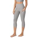 ODODOS Women's High Waisted Yoga Capris with Pockets, Tummy Control Non See Through Workout Athletic Running Capri Leggings