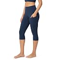 ODODOS Women's High Waisted Yoga Capris with Pockets, Tummy Control Non See Through Workout Athletic Running Capri Leggings
