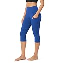 ODODOS Women's High Waisted Yoga Capris with Pockets, Tummy Control Non See Through Workout Athletic Running Capri Leggings