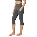 ODODOS Women's High Waisted Yoga Capris with Pockets, Tummy Control Non See Through Workout Athletic Running Capri Leggings
