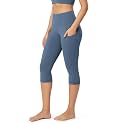 ODODOS Women's High Waisted Yoga Capris with Pockets, Tummy Control Non See Through Workout Athletic Running Capri Leggings