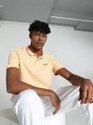 PUMA Solid Men Polo Neck Orange T-Shirt