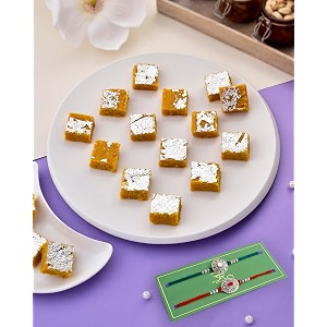 rakhi for brother with sweets set of 2 rakhi with sweet rakhi gift set rakhi with gift rakhi with sweets rakhi with sweets for brother mohan thal sweets 400g ruby amp sapphire rakhi set of 2