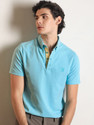 RARE RABBIT Solid Men Polo Neck Blue