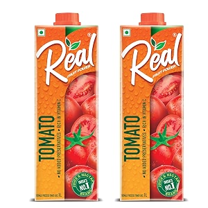 dabur real tomato fruit juice 1l rich in vitamin c no added preservatives no artificial colors amp flavours goodness of best fruits daily dose of fruit nutrition tasty refreshing amp energising drink