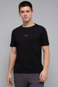 REEBOK Solid Men Round Neck Black T-Shirt