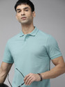 Roadster Solid Men Polo Neck Yellow T-Shirt