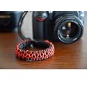 RUBRIC® Braided Herringbone Paracord Hand Grip Wrist Strap for All DSLR Camera/Binoculars (Black and Orange HB)