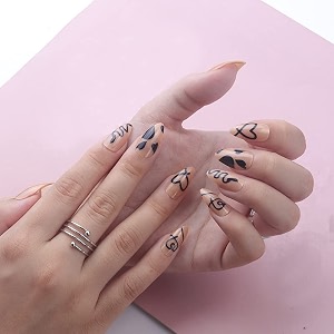 secret lives acrylic press on nails designer artifical nail extension almond shape nude color with black heart design 24 pieces set with manicure kit convinent than manicure