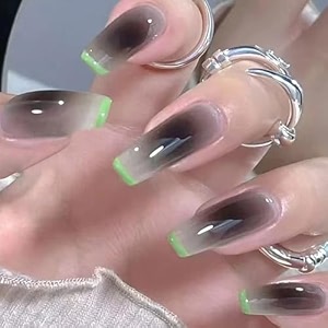 secret lives glossy reusable artificial coffin shape translucent black color with green tip design press on nails 24 pieces set with kit
