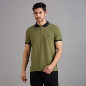 Skechers Solid Men Polo Neck Green T-Shirt