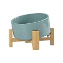 SPUNKYJUNKY 15° Slanted Ceramic Dog and Cat Bowl with Wooden Stand, Tilted Bulldog Food and Water Bowl No Slip Non-Spill for Cats Medium Dogs Big Face Pets 28.7 OZ (3.6 Cups, Light Green)