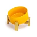 SPUNKYJUNKY 15° Slanted Ceramic Dog and Cat Bowl with Wooden Stand, Tilted Bulldog Food and Water Bowl No Slip Non-Spill for Cats Medium Dogs Big Face Pets 28.7 OZ (3.6 Cups, Yellow)