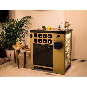 haus of bars steel by speedx - model x home bar cabinet mat gold amp mat black finish with built in 30l thermoelectric fridge easily movable with wheels at the bottom