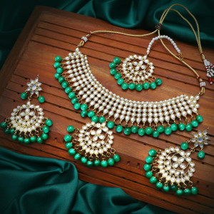 sukkhi alloy gold-plated green jewellery set