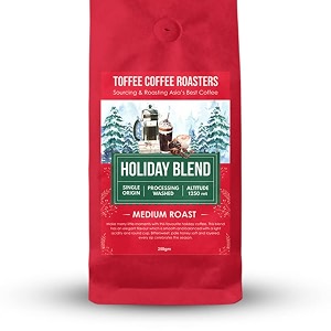 toffee coffee roasters  holiday blend coffee  speciality blend 100 arabica  medium roast  notes bittersweet pale honey sift and layered  grind whole beans freshly roasted  250 gm