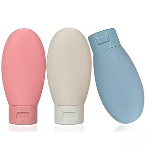 travel bottle set silicone refillable containers for toiletries pink beige and blue pack of 3