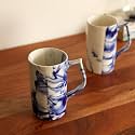 Unravel Stylish Ceramic Beer Mugs – Set of 2 | Drinking Hot & Cold Beverages | Handcrafted Tea/Coffee Mug | Cups Ideal for Daily Use | Durable & Long Lasting Gift | Cylindrical (White & Blue)
