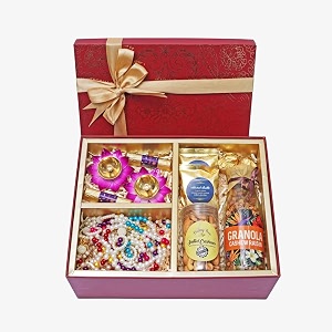velvet fine chocolates diwali gift hamper  sweet temptations  fruit amp nut logs almond brittles salted cashews granola lotus diyas amp toran  perfect diwali gift  pack of 1